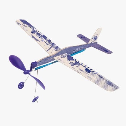 Avion bleu a elastique Les Petites Merveilles Moulin Roty
